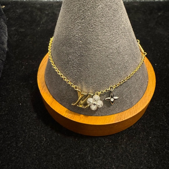 Louis Vuitton Jewelry - Louis Vuitton Gold and Silver Monogram Charm Bracelet M61084 LE1124